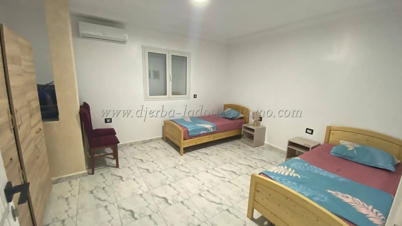 Chambre avec lits dans une location à Djerba